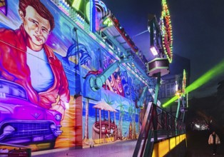 Colourfully illuminated All Saints Fair at night, the largest old town fair in Europe, Soest, North