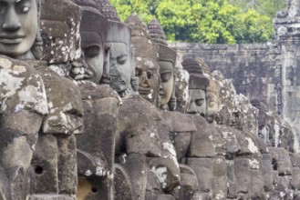54 demons on the bridge at the south gate of Angkor Thom (Hindu myth of the Cherry of the Milk