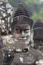54 demons on the bridge at the south gate of Angkor Thom (Hindu myth of the Cherry of the Milk