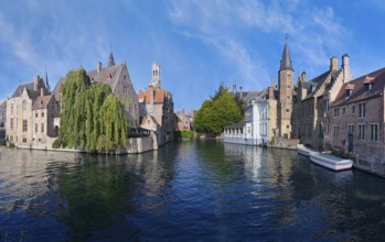 Famous view of Bruges old city with the Belfry and the Dijver canal, Bruges, Flanders, Belgium