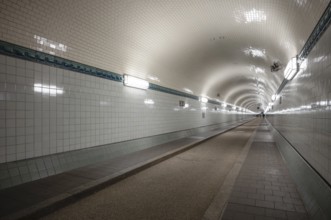 Interior view, pedestrians crossing tunnel, tube, historic old Elbe Tunnel, Free and Hanseatic City