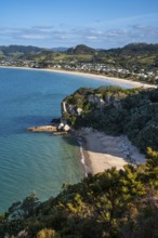 Landscape with sea and sandy beach in New Zealand. View of Lonely Bay and Cooks Beach from