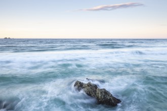 View from The Pass: The rocks and waves in the foreground, behind the Nguthungulli Julian Rocks