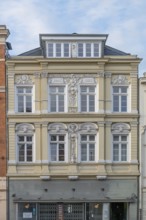 Decorative façade of the upper floors of a residential building, built in 1884, Hanseatic City of