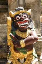 Demon, figure in Pura Dalem Penataran Taman, Sanur, Bali, Indonesia