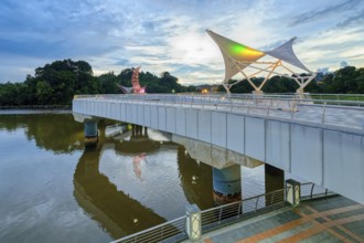 Pedestrian bridge at sunset in the Masjid Omar Ali Saifuddien Mosque complex, Bandar Seri Begawan,