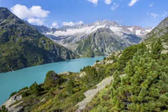 Turquoise blue mountain lake Göscheneralpsee, picturesque mountain landscape with dammastock and