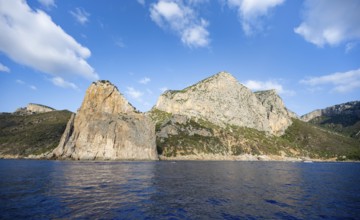 Picturesque rocky coast, cliffs with Pedra Longa pinnacle, blue sea, Golfo di Orosei, Baunei,