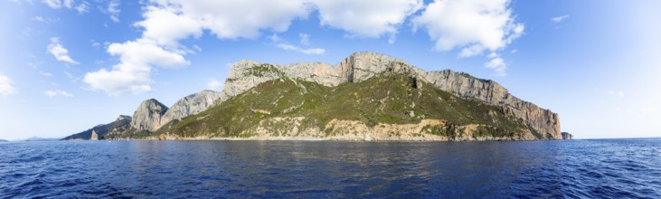 Panorama, picturesque rocky coast, cliffs and blue sea, Golfo di Orosei, Baunei, Sardinia, Italy