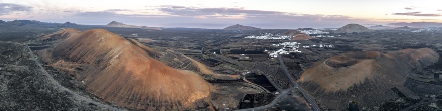 Picturesque volcanic landscape with volcanic craters Montaña de la Tabaiba and Montaña Corujo at