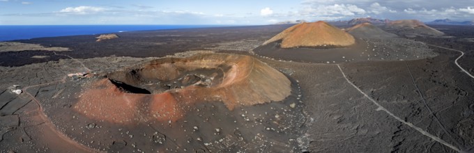 Montaña Quemada and Montaña Pedro Perico volcanoes, volcanic landscape with craters and lava