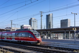 The skyline of downtown Dortmund, seen from the main train station, Regionalbahn, RB43, North