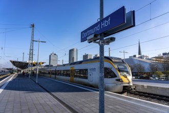 The skyline of the city center of Dortmund as seen from the main train station, Eurobahn train,