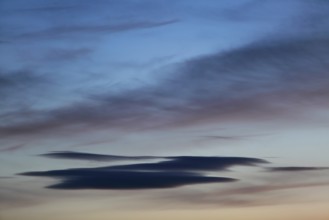 Soft shades of blue and pastel clouds at dusk, Peenetal nature park Park, Mecklenburg-Western