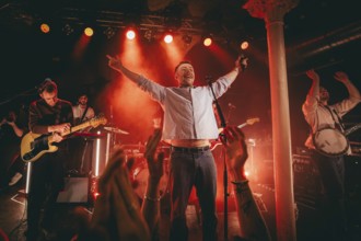 Eoin Fitz Fitzgibbon (guitarist), Eddie Keogh (singer) and Eoghan McGoo McGrath (banjo player) from