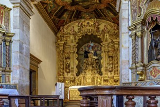 Altar and interior of an old baroque church in the historic city of Tiradentes in Minas Gerais,