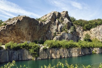 Impressive rock formations, opal lake in the granite quarry, Moselleøkken Stenbrudsmuseum, museum
