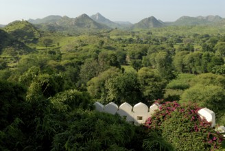 Hilly, green landscape of Aravalli Mountains in monsoon, view from Palace Hotel Devigarh, Delwara