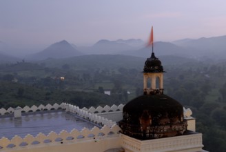 Hilly landscape of Aravalli Mountains in soft twilight, monsoon atmosphere, Devigarh Palace Hotel,