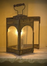 Antique metal lantern with warm light, rustic charm, Karni Fort Bambora Palace Hotel, Bambora,