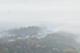 Aichelberg Alb climb of the A8 in thick fog on an autumn morning. Lkr. Göppingen,