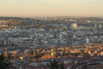 View of the city center in warm sunset light from Santiago de Chile Platz Stuttgart, Germany