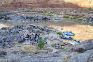 Loma, Colorado - Many children are part of a river rafting group camped in Ruby Canyon along the