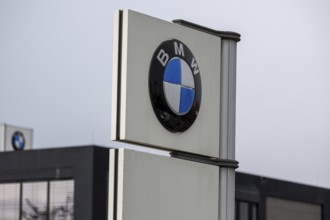 BMW sign on a car dealership