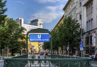 Rosa Luxemburg Platz subway exit with the Park Inn at Alexanderplatz in the background, Berlin,