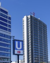 Subway sign for line U2 in front of the skyscrapers at Ernst Reuter Platz, Berlin, Germany