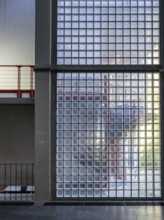 Wall made of glass blocks in the style of the 60s on the grounds of the Technical University of