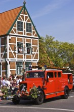 Typical half-timbered house, architecture, parade, blossom festival, fire engine, classic car,