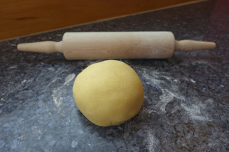Southern German cuisine, preparation of shortcrust pastry, raw dough on the worktop, rolling pin,