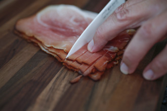 Southern German cuisine, Black Forest ham, smoked, meat, cutting, kitchen knife, wooden board,