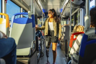 Young amputee woman riding public transport, confidently moving through the bus aisle with her