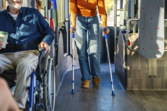 People with disabilities navigating public transportation, with one passenger using a wheelchair