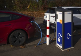 Parking lot with gas pump, EnBW charging station for electric cars, charging station, e-charging