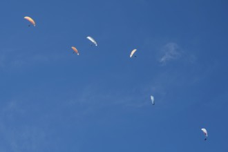 Paragliders in the sky above Brauneck, forming a diagonal, Bavarian Prealps, Isarwinkel, Lenggries,