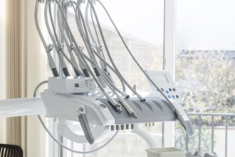 Dental equipment, doctor's unit, module, in a bright clinic, with modern technology, no people,