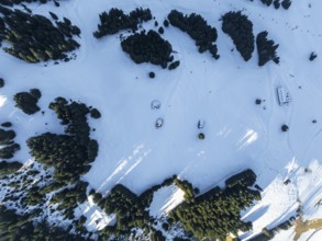 Top Down View, huts in a fantastic winter landscape, aerial view of the Wilder Kaiser ski area,
