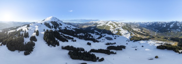 Wonderful winter landscape with Hohe Salve, blue sky and snow, mountains and mountain valley,