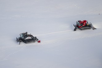 Two snow groomers level ski slopes, Hochbrixen in winter, Skiwelt Wilder Kaiser Brixental, Tyrol,