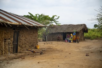 Villagers in a traditional village, mud huts, Sadaani, Tanzania