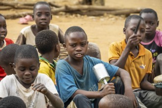 Group of children playing music with rattles, in a Sadaani village, Tanga, Tanzania