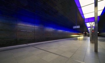HafenCity University subway station, illuminated in color, blue, underground train, movement