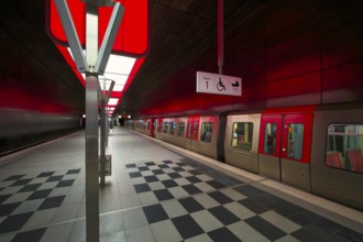 HafenCity University underground station, illuminated in color, green, underground train, U4,