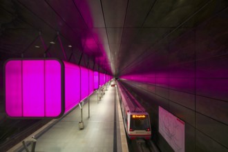 HafenCity University underground station, illuminated in color, magenta, underground train, U4,