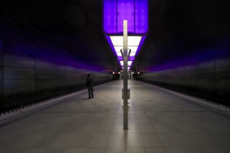 HafenCity University subway station, illuminated in color, purple, traveler, platform, stop, train