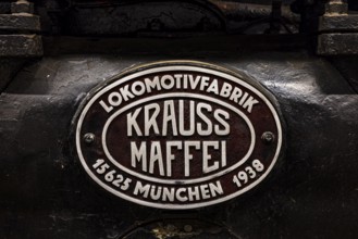 Name plate of the former locomotive factory, Kraus Maffei from Munich on a historic locomotive with