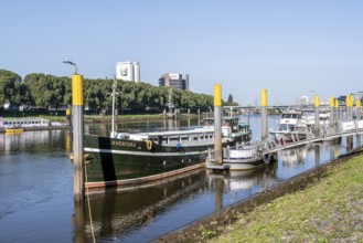 Small boats and ships at Marina Bremen on the Weser, Weserpromenade, Bremen, Germany